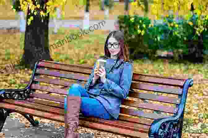 A Young Woman Sitting On A Park Bench, Her Head In Her Hands. The Passage Of Galloway Dea Loher